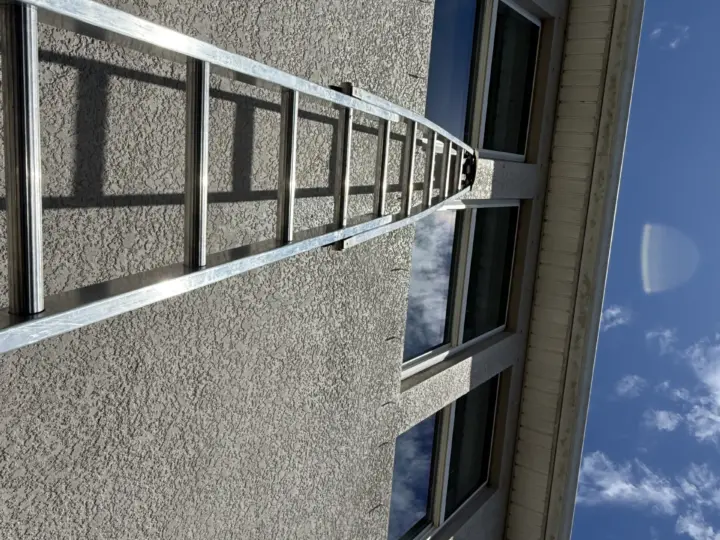 Extension ladder against a two-story wall in Odessa