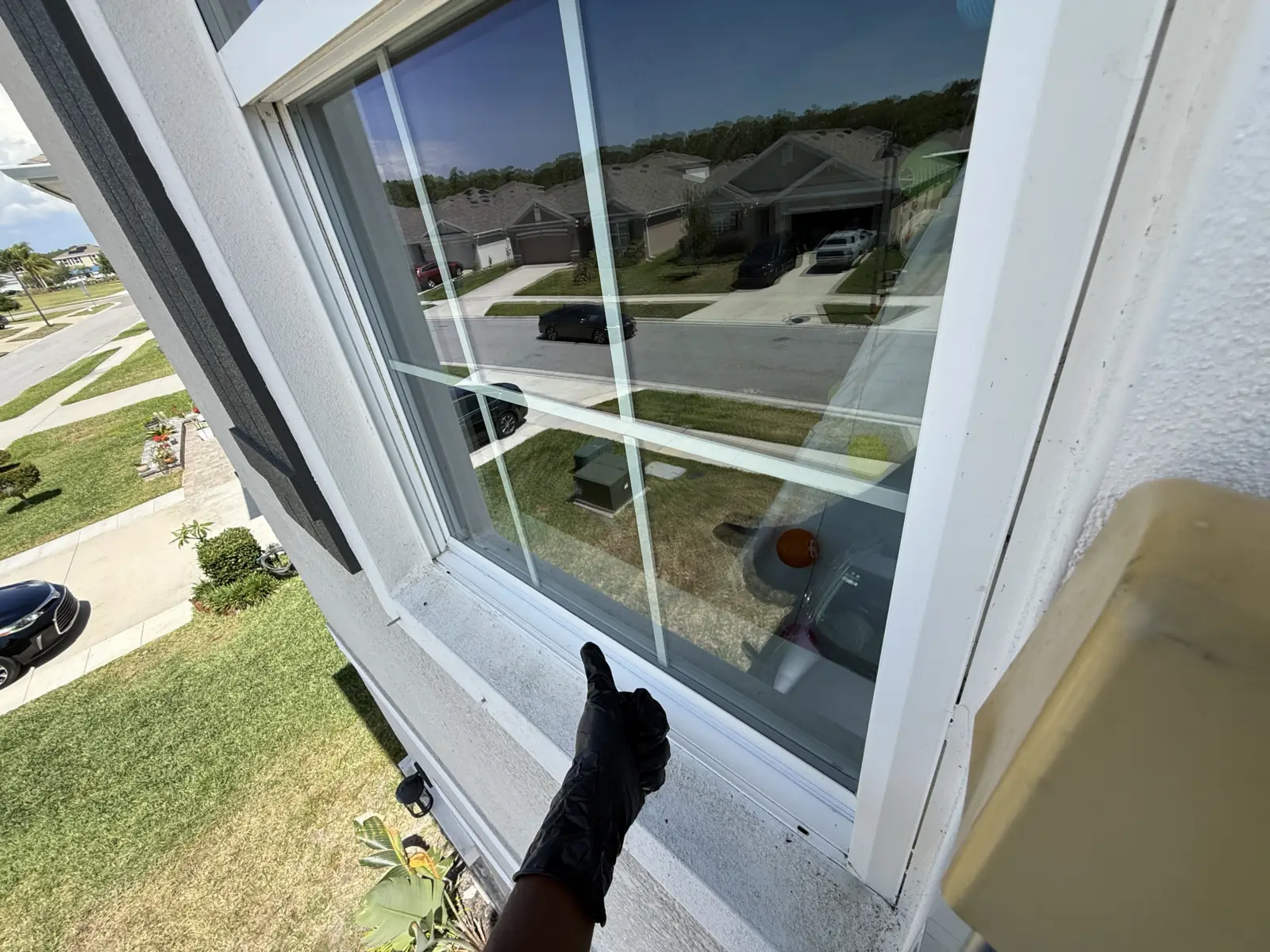 Second-floor window cleaned in Odessa, looking out over the street