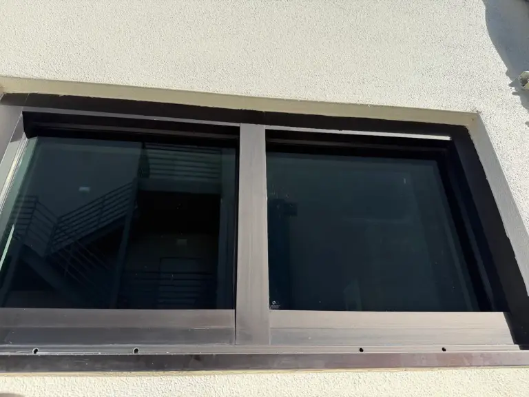 Office windows after cleaning, with clear glass and wiped frames