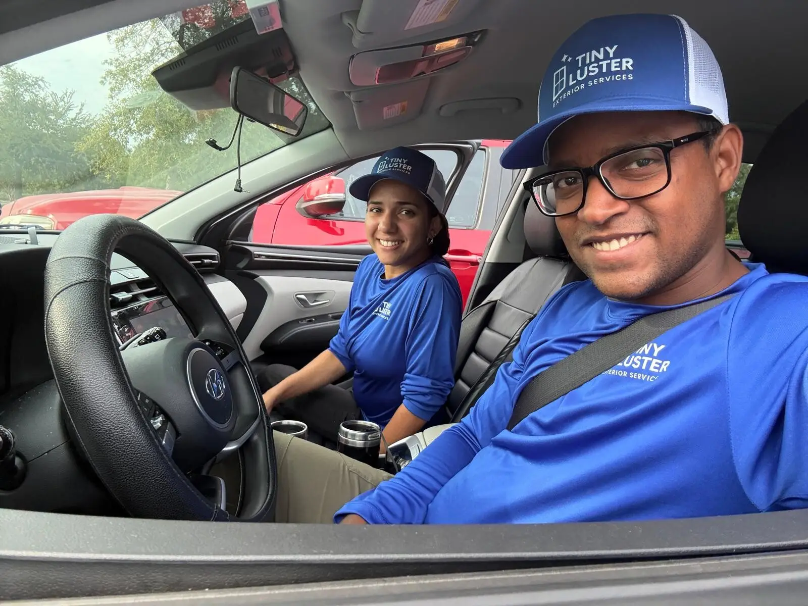 Founders of Tiny Luster Exterior Services LLC in company uniforms in Tampa, FL