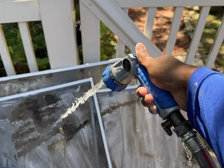 Window screens taken out and washed with the hose (Land O' Lakes)