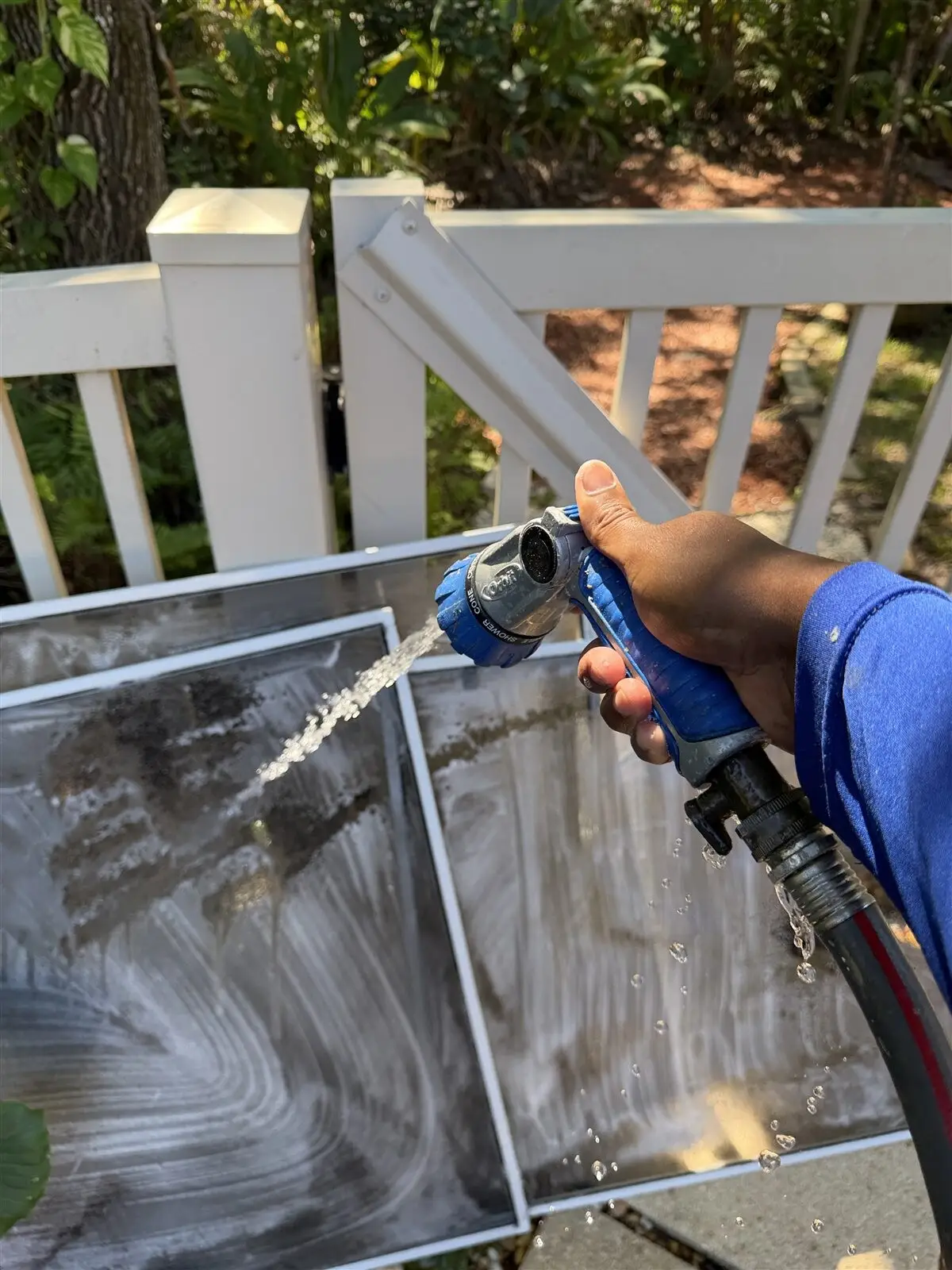 Window screens taken out and washed with the hose (Land O' Lakes)